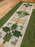 Vintage Swedish Green Kilim rug by Fredrik Fiedler