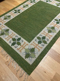 Vintage Swedish Green Kilim rug by Fredrik Fiedler