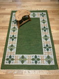 Vintage Swedish Green Kilim rug by Fredrik Fiedler