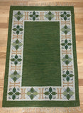 Vintage Swedish Green Kilim rug by Fredrik Fiedler