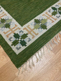 Vintage Swedish Green Kilim rug by Fredrik Fiedler